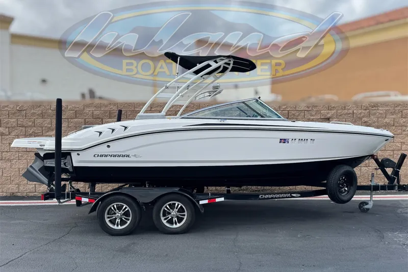 The Image of 2020 Chaparral 21 Surf boat on trailer at Inland Boat Center. - 0