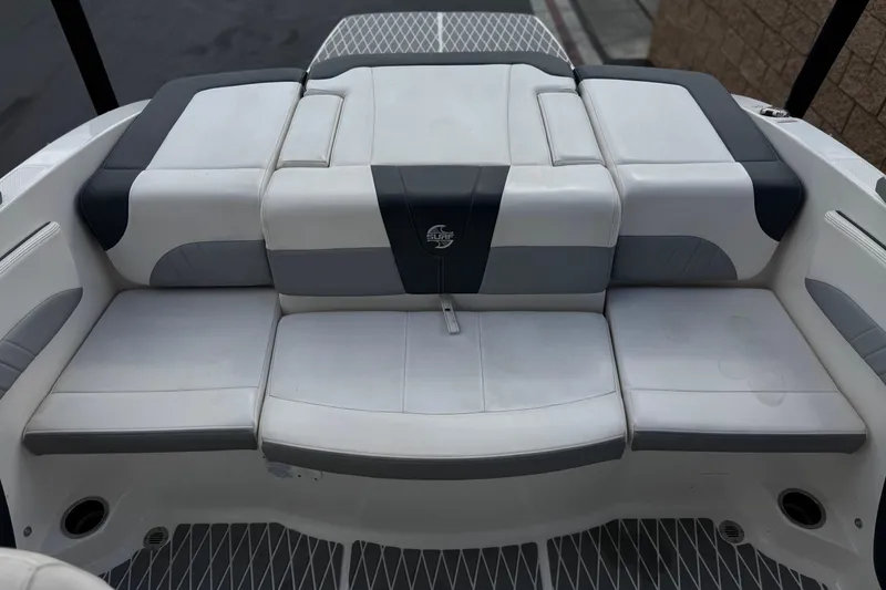 Slide: The Image of 2020 Chaparral 21 Surf boat interior with cushioned seating and stylish design. - 19