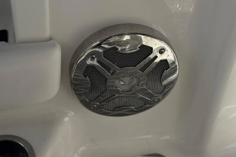 Slide: The Image of Close-up of a speaker on a 2020 Chaparral 21 Surf boat. - 25