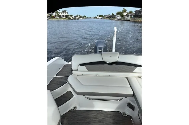 Slide: The Image of 2020 Four Winns HD220 OB boat interior with water view. - 15