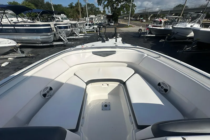 Slide: The Image of 2018 Robalo R247 Dual Console boat interior with spacious seating and modern design. - 11