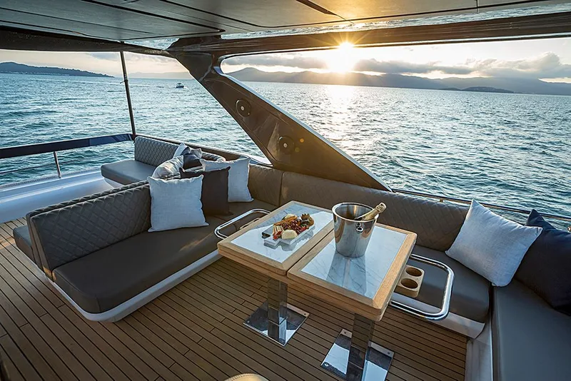 Slide: The Image of Luxurious Schaefer 600 yacht with sunset and ocean view, model year 2027. - 10