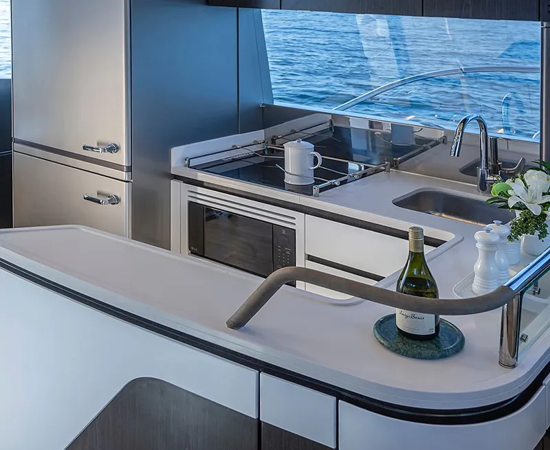 Slide: The Image of Modern kitchen on a Schaefer 600 yacht, year 2027. - 12