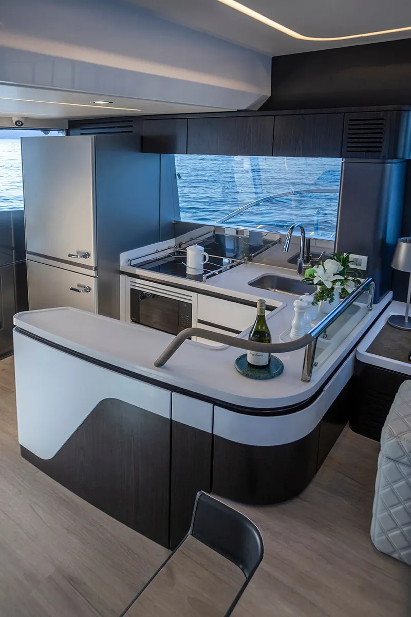 Slide: The Image of Modern kitchen on Schaefer 600 yacht, year 2027. - 13