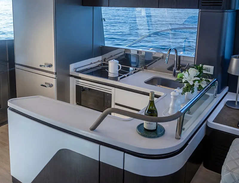 Slide: The Image of Modern kitchen on a 2027 Schaefer 600 yacht. - 14