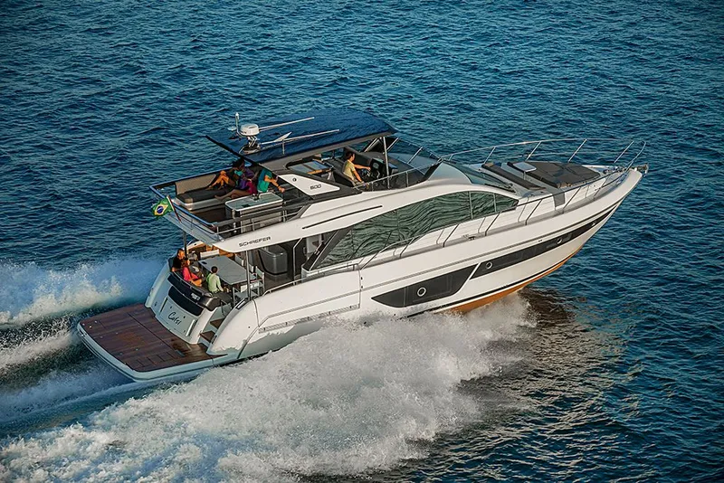 Slide: The Image of Luxury yacht Schaefer 600 from 2027 cruising on the sea. - 2