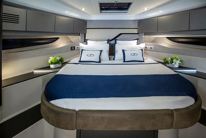 Slide: The Image of Luxurious bedroom on the Schaefer 600 yacht, model year 2027. - 20