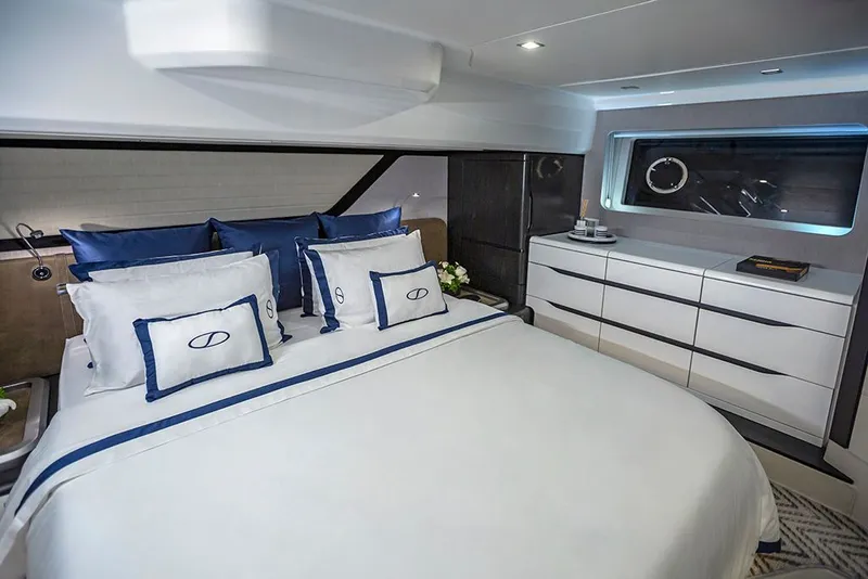Slide: The Image of Luxurious bedroom on the Schaefer 600 yacht, model year 2027. - 25