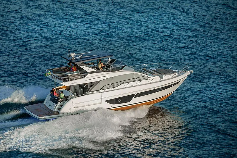 Slide: The Image of Luxury yacht Schaefer 600 from 2027 cruising on open sea. - 3