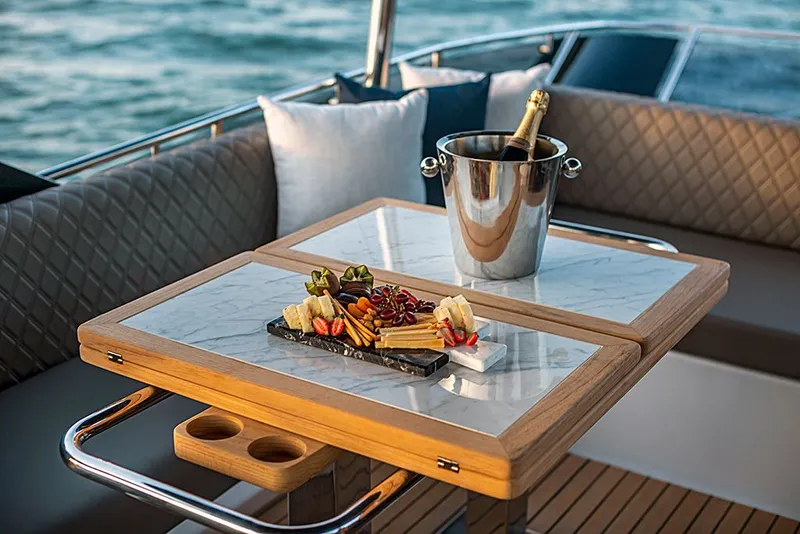 Slide: The Image of Luxurious Schaefer 600 table with cheese platter and champagne, 2027 model. - 31