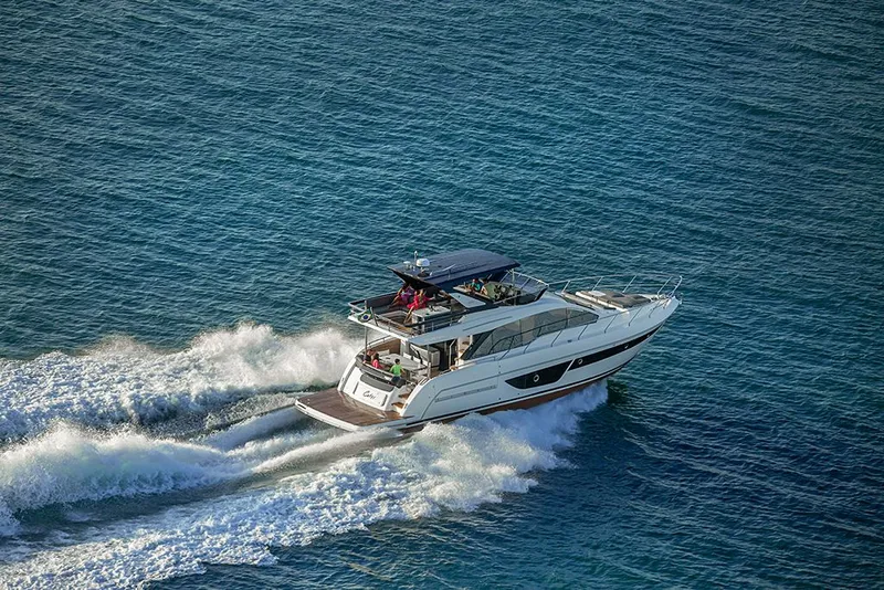 Slide: The Image of Schaefer 600 Yacht 2027 cruising swiftly on open sea. - 5