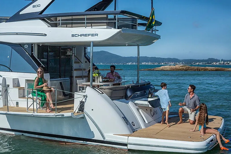 Slide: The Image of Family enjoying on Schaefer 600 yacht in 2027. - 7