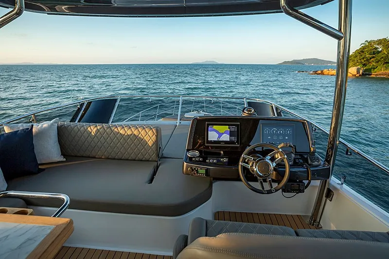 Slide: The Image of Luxurious Schaefer 600 yacht cockpit with ocean view, model year 2027. - 9