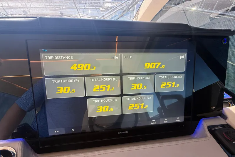 Slide: The Image of Dashboard display of a 2022 Regal 42 FXO showing trip statistics and fuel usage. - 29