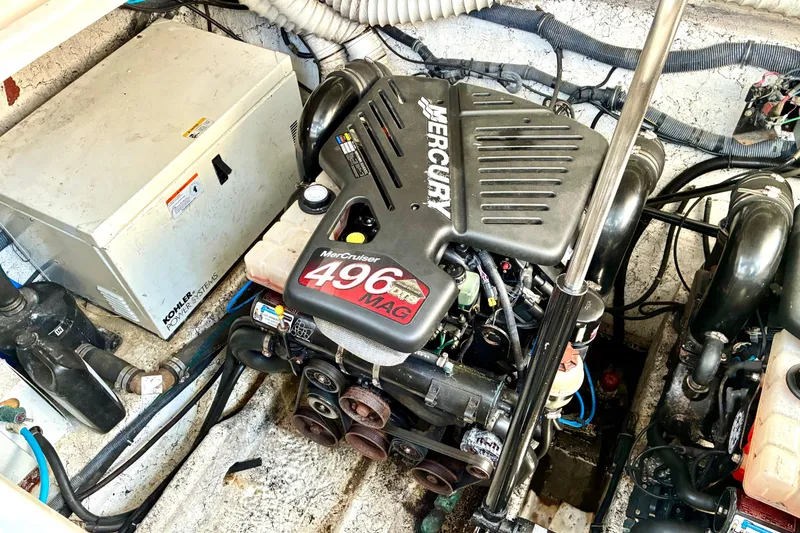 Slide: The Image of Engine compartment of a 2006 Rinker 390 Express Cruiser with MerCruiser 496 MAG engine. - 46