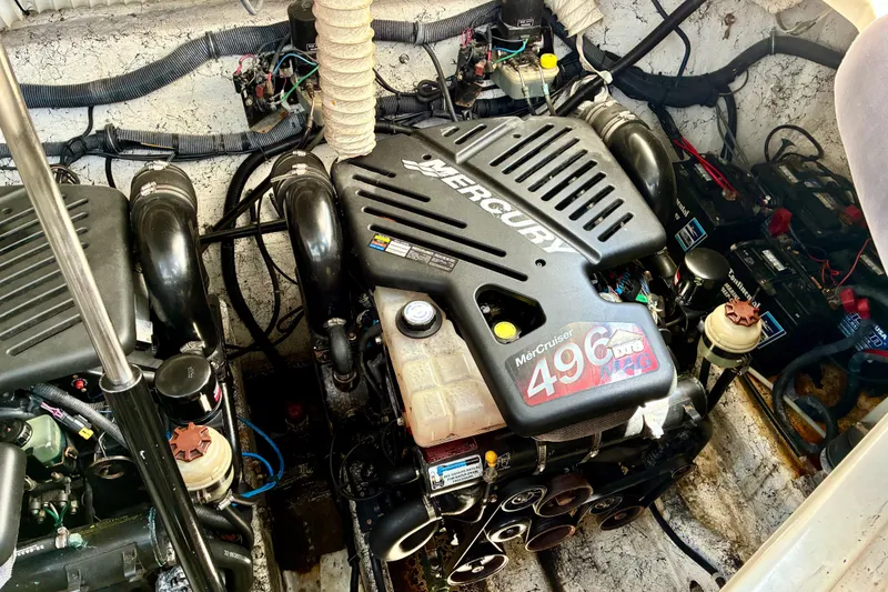 Slide: The Image of Engine compartment of a 2006 Rinker 390 Express Cruiser with Mercury MerCruiser 496 MAG engine. - 47