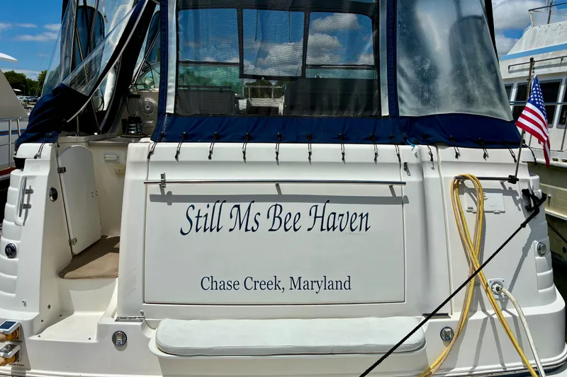 Slide: The Image of 2006 Rinker 390 Express Cruiser named "Still Ms Bee Haven" docked in Chase Creek, Maryland. - 5