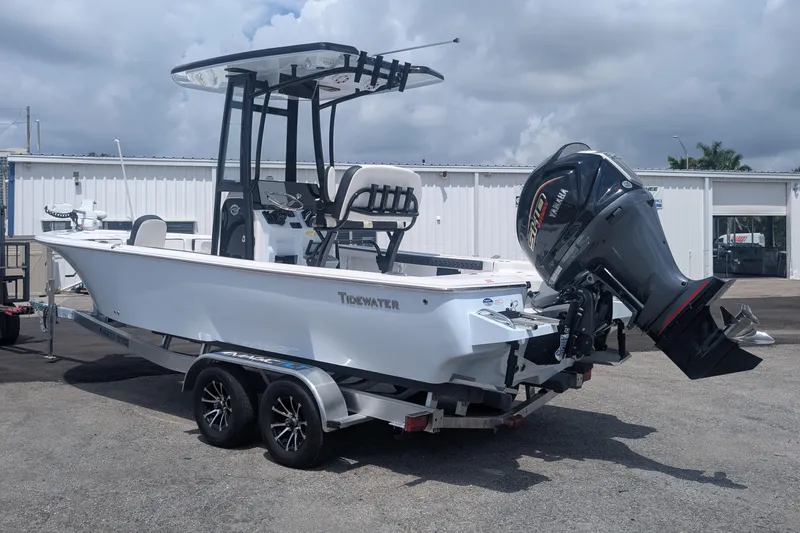 Slide: The Image of 2026 Tidewater 2300 Carolina Bay boat with Yamaha engine on trailer. - 2