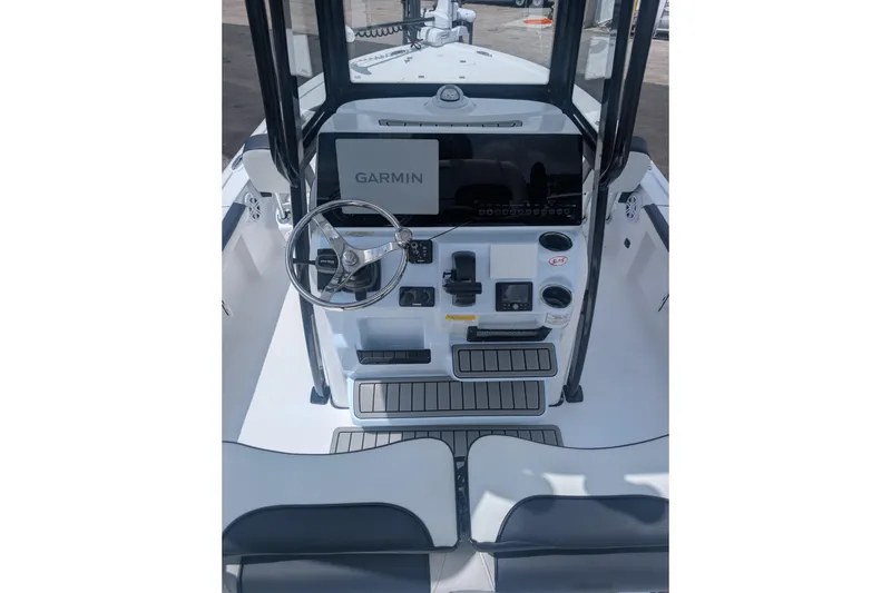 Slide: The Image of 2026 Tidewater 2300 Carolina Bay boat dashboard with Garmin navigation system. - 6
