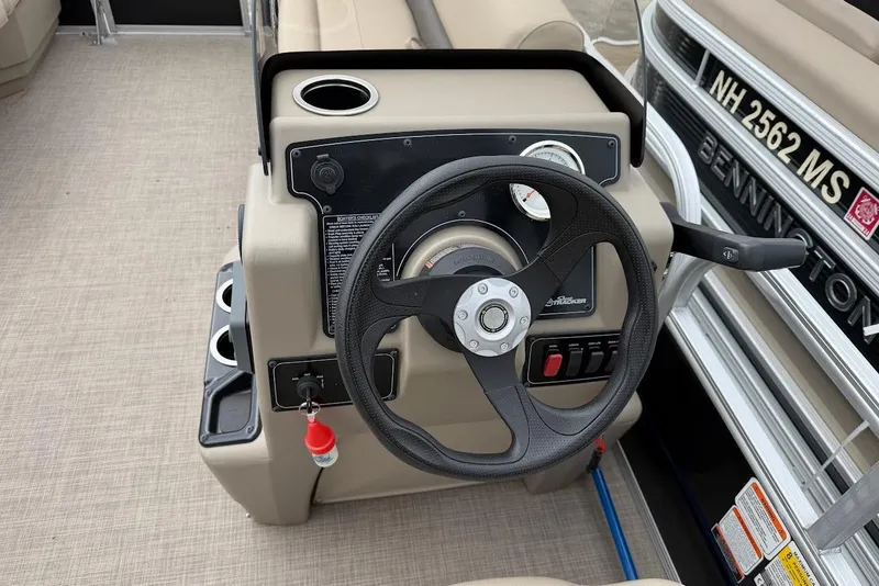 Slide: The Image of Steering console of 2025 Sun Tracker Party Barge 16 DLX pontoon boat. - 45