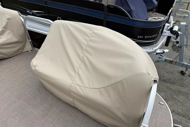 Slide: The Image of 2025 Sun Tracker Party Barge 16 DLX with covered seating on deck. - 53