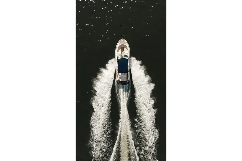 Slide: The Image of Luxurious interior of 2020 Chris-Craft Launch 31 GT boat with elegant seating and dashboard. - 13