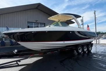 Slide: The Image of Luxurious interior of 2020 Chris-Craft Launch 31 GT with elegant beige seating. - 14