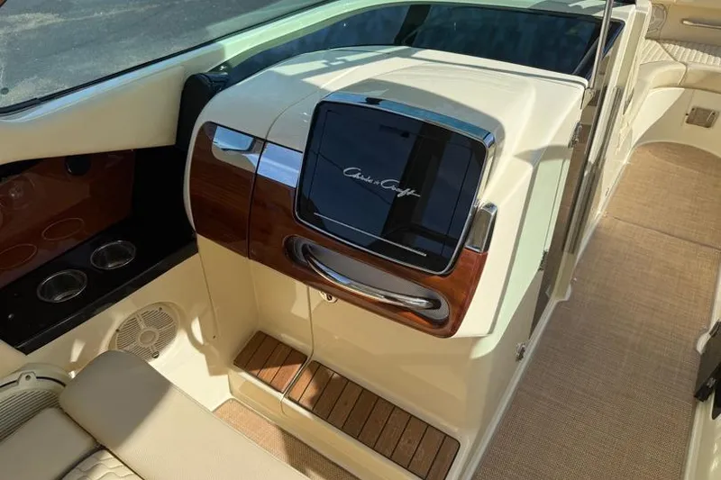 Slide: The Image of 2020 Chris-Craft Launch 31 GT interior with elegant wood and chrome accents. - 23
