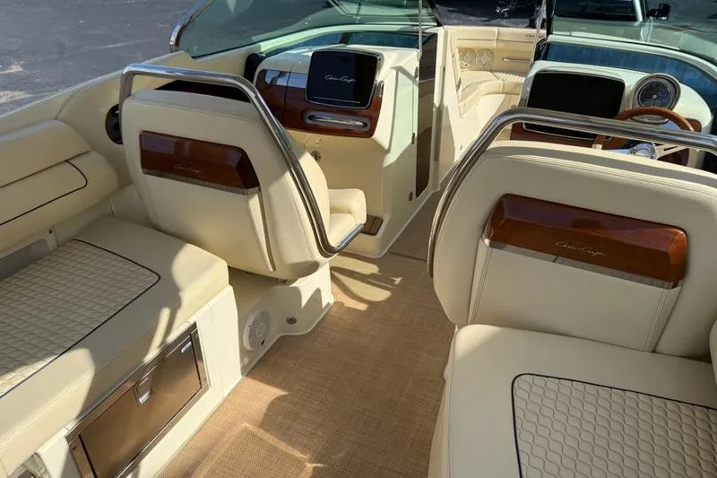 Slide: The Image of Luxurious interior of 2020 Chris-Craft Launch 31 GT boat with elegant seating and dashboard. - 27