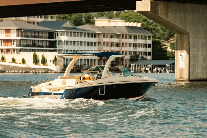 Slide: The Image of Luxurious interior of 2020 Chris-Craft Launch 31 GT boat with beige seating and cup holders. - 3