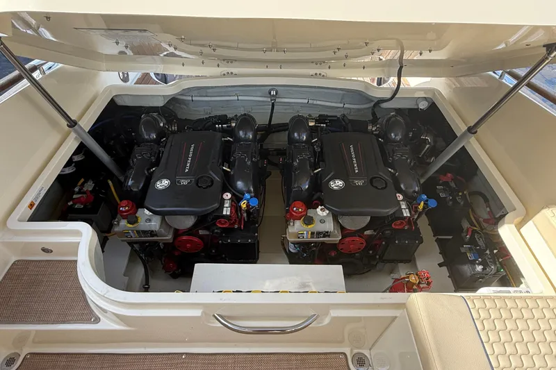 Slide: The Image of Engine compartment of 2020 Chris-Craft Launch 31 GT, showcasing dual powerful engines. - 30