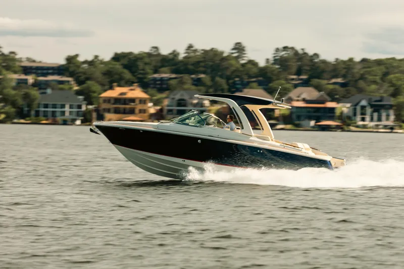 Slide: The Image of Luxurious seating area on 2020 Chris-Craft Launch 31 GT boat, featuring beige upholstery. - 4