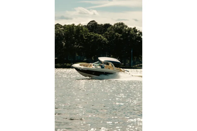 Slide: The Image of 2020 Chris-Craft Launch 31 GT interior with luxurious beige seating and elegant design. - 7