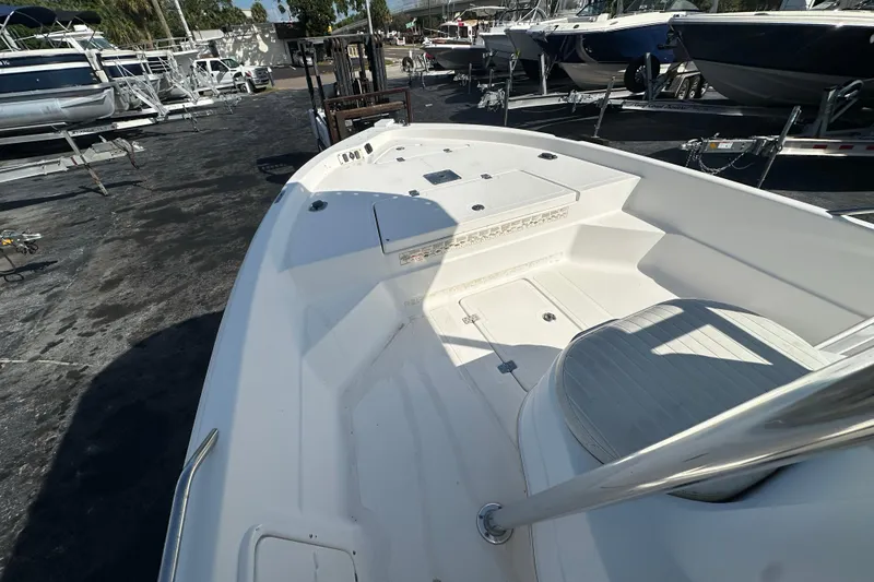 Slide: The Image of 2005 NauticStar 1900 NauticBay boat interior, showcasing spacious seating and storage areas. - 11