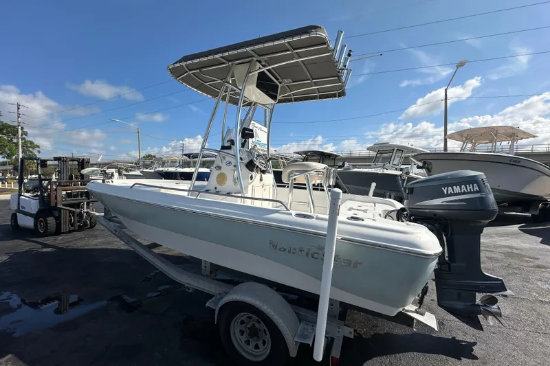 Slide: The Image of 2005 NauticStar 1900 NauticBay boat with Yamaha outboard motor on trailer. - 5