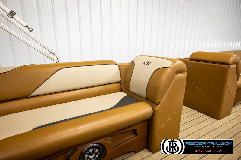 Slide: The Image of Luxurious tan and cream seating in 2023 Avalon VEN CR boat interior. - 26