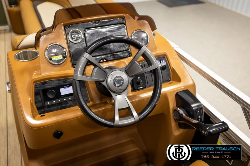Slide: The Image of Steering console of 2023 Avalon VEN CR boat with modern controls and dashboard. - 31