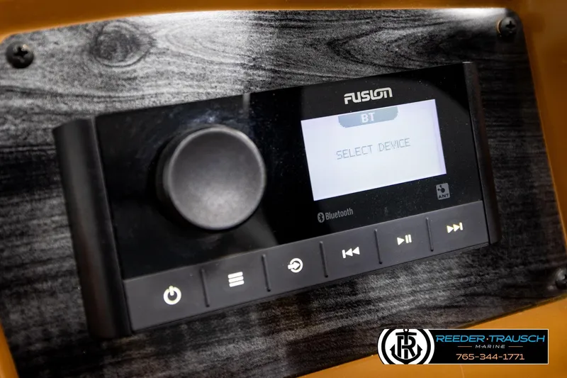 Slide: The Image of Close-up of a Fusion Bluetooth audio system in a 2023 Avalon VEN CR boat. - 33