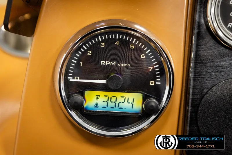 Slide: The Image of Close-up of 2023 Avalon VEN CR RPM gauge displaying 390.24 hours. - 34