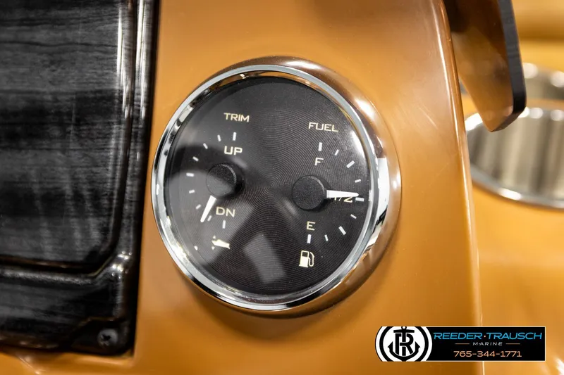 Slide: The Image of Close-up of 2023 Avalon VEN CR fuel and trim gauge on dashboard. - 37