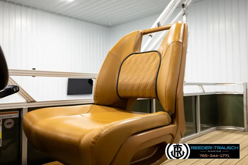 Slide: The Image of Luxurious tan seat in 2023 Avalon VEN CR boat, showcased indoors. - 41