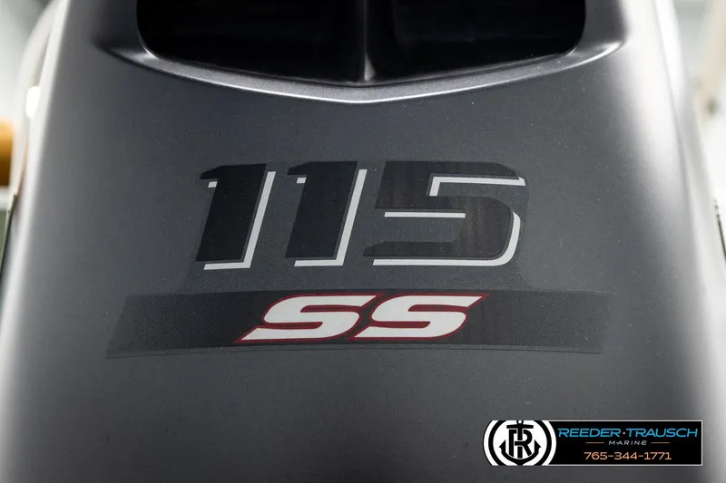 Slide: The Image of Close-up of Avalon VEN CR 2023 engine cover with "115 SS" branding. - 52