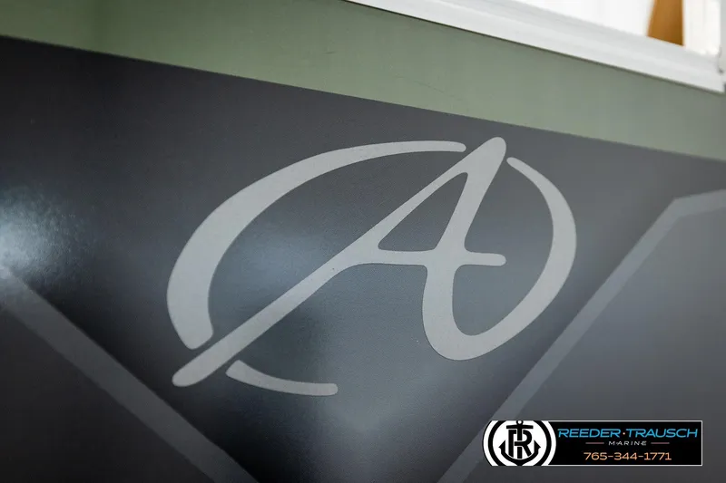 Slide: The Image of 2023 Avalon VEN CR boat logo with Reeder-Trausch Marine contact details. - 57