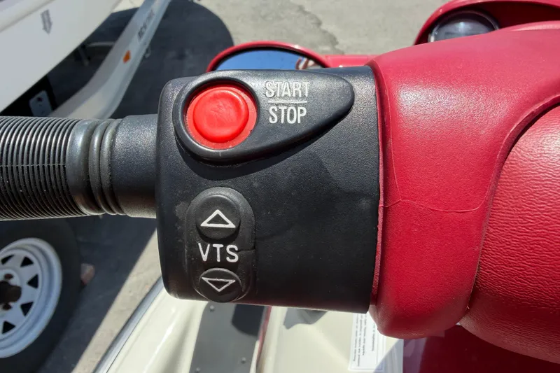 Slide: The Image of 1999 Sea Doo Jet Ski handlebar with start/stop button and VTS controls. - 10