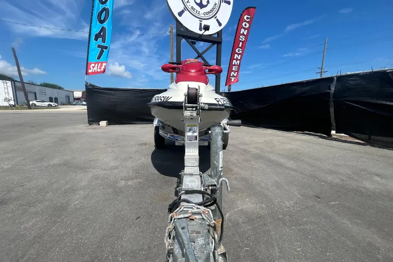 Slide: The Image of 1999 Sea Doo Jet Ski on trailer at boat sale consignment lot. - 15
