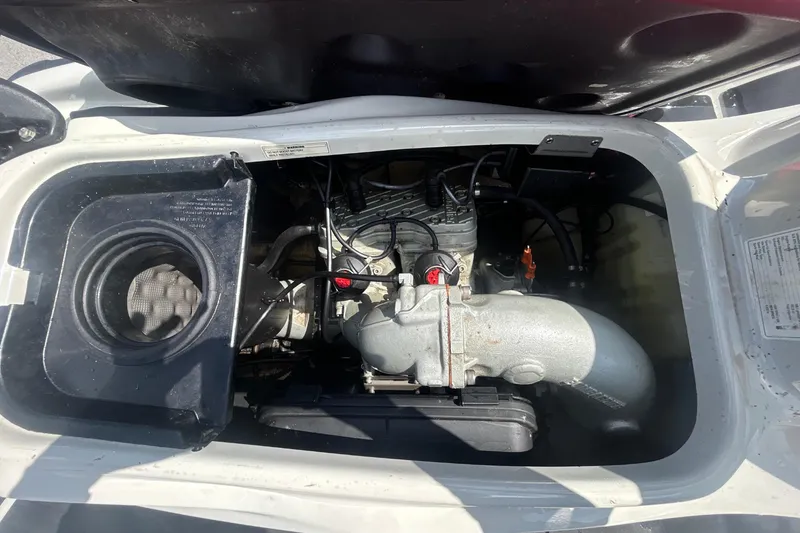 Slide: The Image of Engine compartment of a 1999 Sea-Doo GSX jet ski. - 19