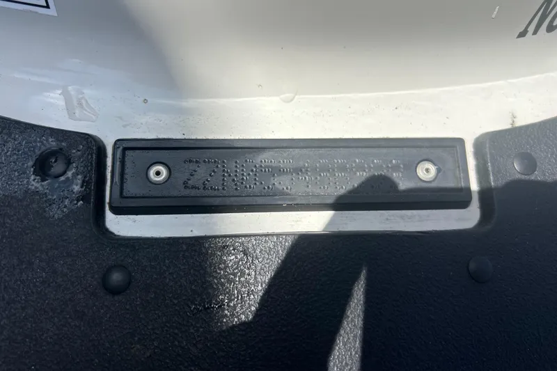 Slide: The Image of 1999 Sea Doo Jet Ski hull identification plate with embossed details. - 22