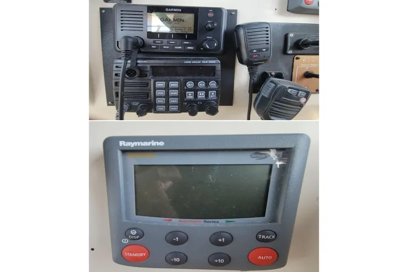 Slide: The Image of Control panel of a 1989 Navigator 34 Flybridge with Garmin and Raymarine equipment. - 9