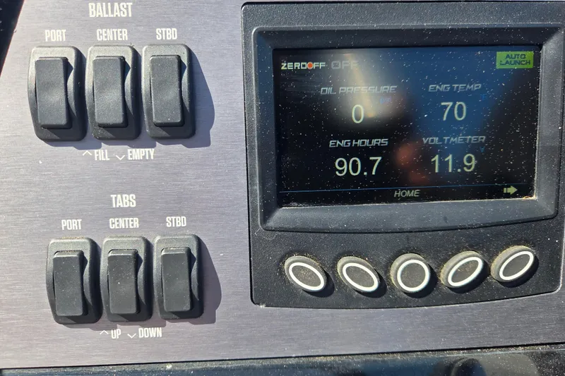 Slide: The Image of Control panel of 2022 MasterCraft NXT24 boat showing ballast and engine data. - 7