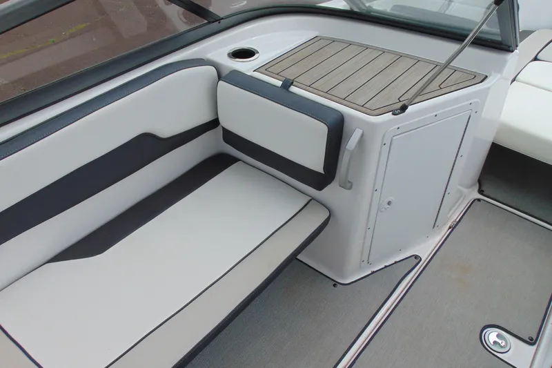 Slide: The Image of Interior seating of 2021 Yamaha AR195 boat with sleek design and storage compartment. - 8
